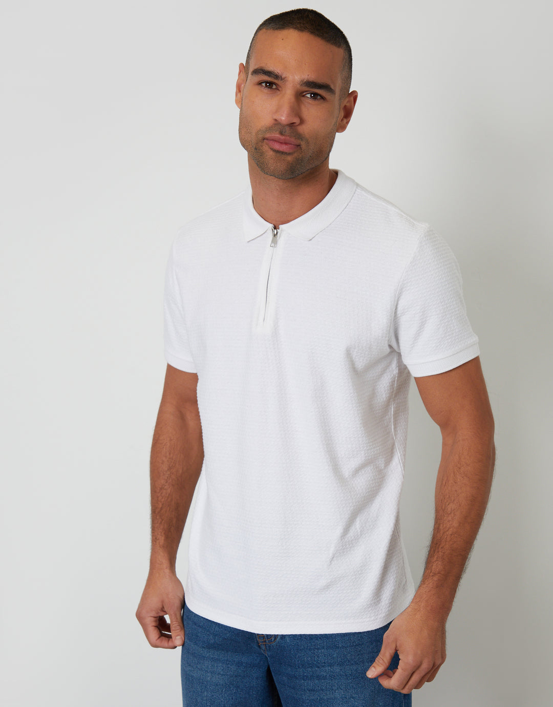 Threadbare Textured Quarter Zip Polo Shirt in White - front view