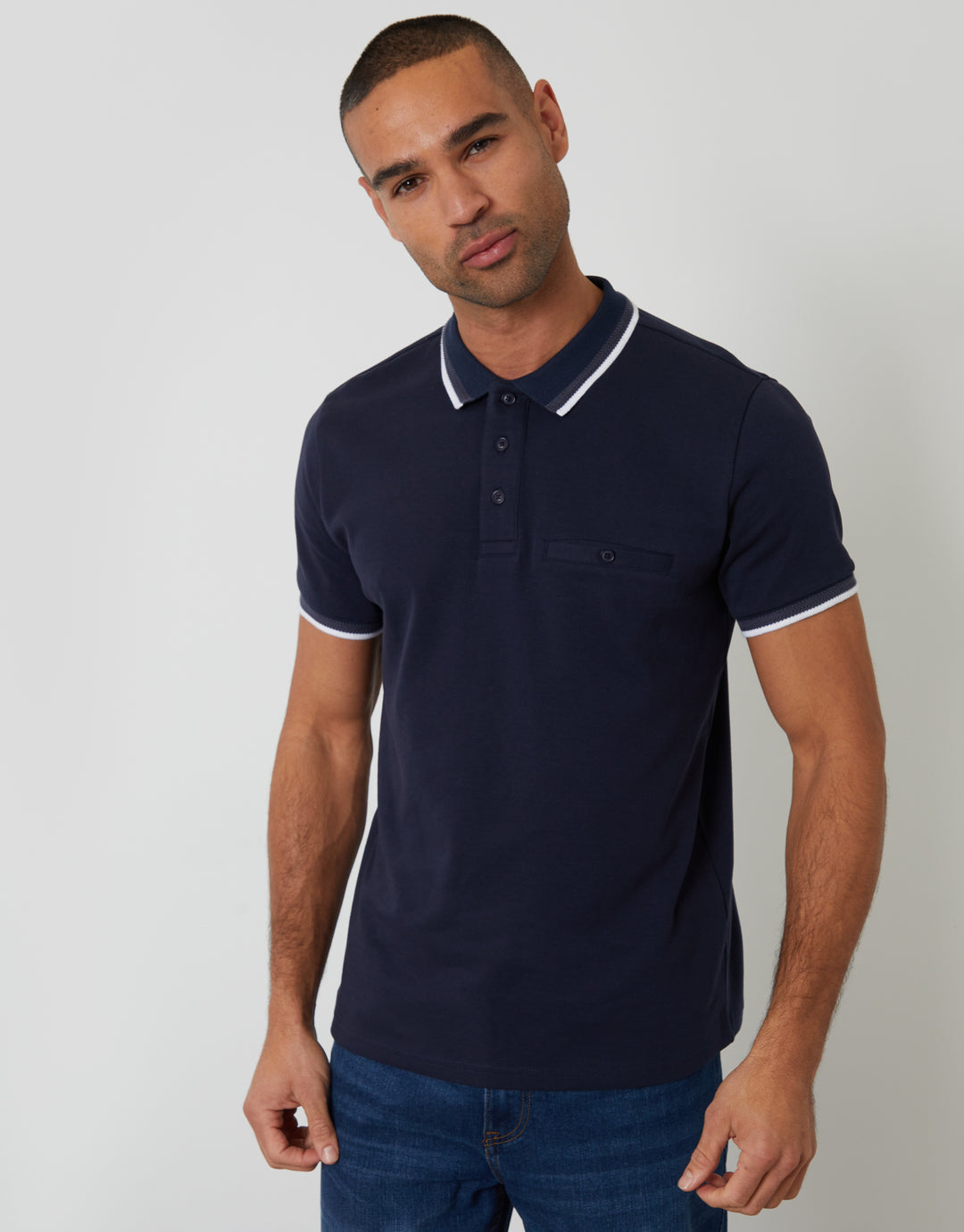 Threadbare Jetted Pocket Cotton Interlock Polo Shirt in Navy - front view