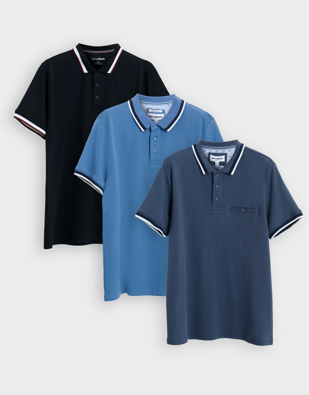 Threadbare 3 Pack Jet Pocket Contrast Tipping Polo Shirts in Black, Light Blue & Denim Blue - 3-pack flat lay