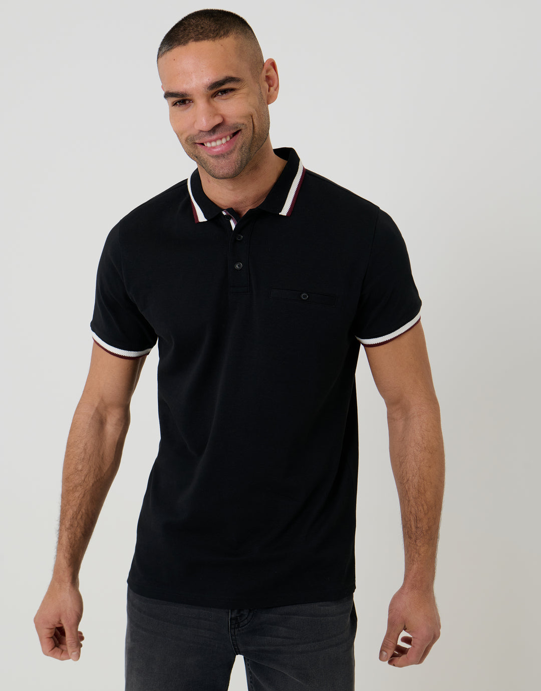 Threadbare Jet Pocket Contrast Tipping Polo Shirt in Black - front view