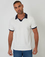 Threadbare Trophy Neck Waffle Polo Shirt in White - front view