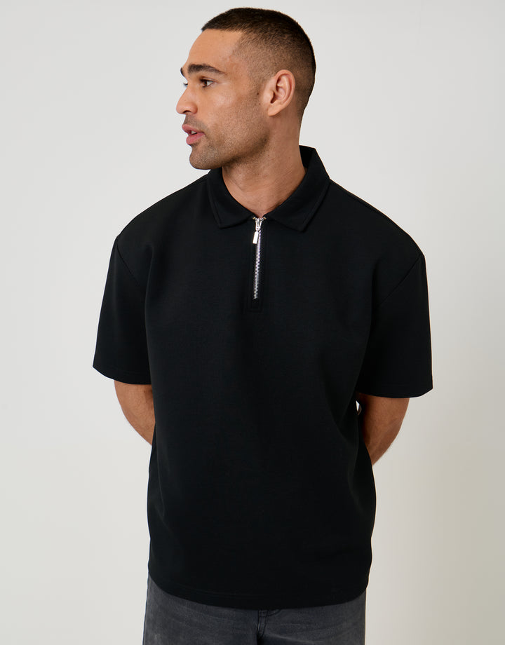 Threadbare Oversized Quarter Zip Polo Shirt in Black - front view