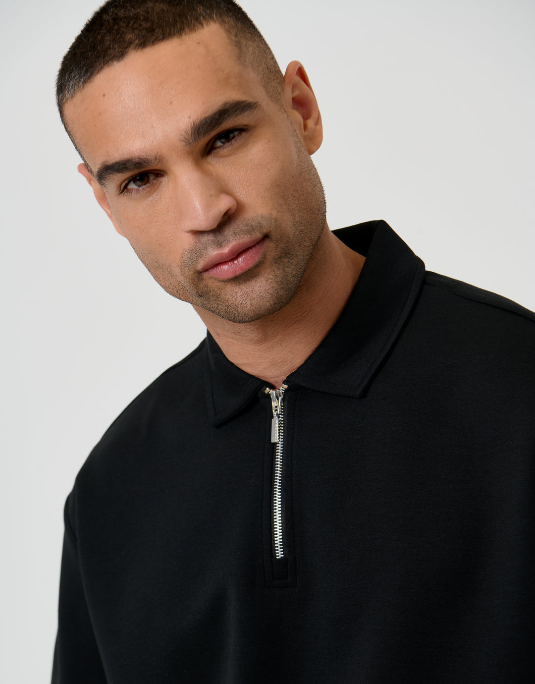 Threadbare Oversized Quarter Zip Polo Shirt in Black - collar close up