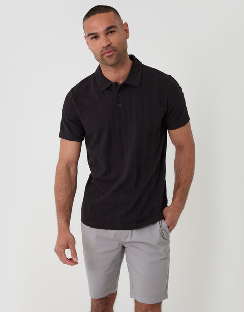 Threadbare Textured Cotton Polo Shirt in Black - front view