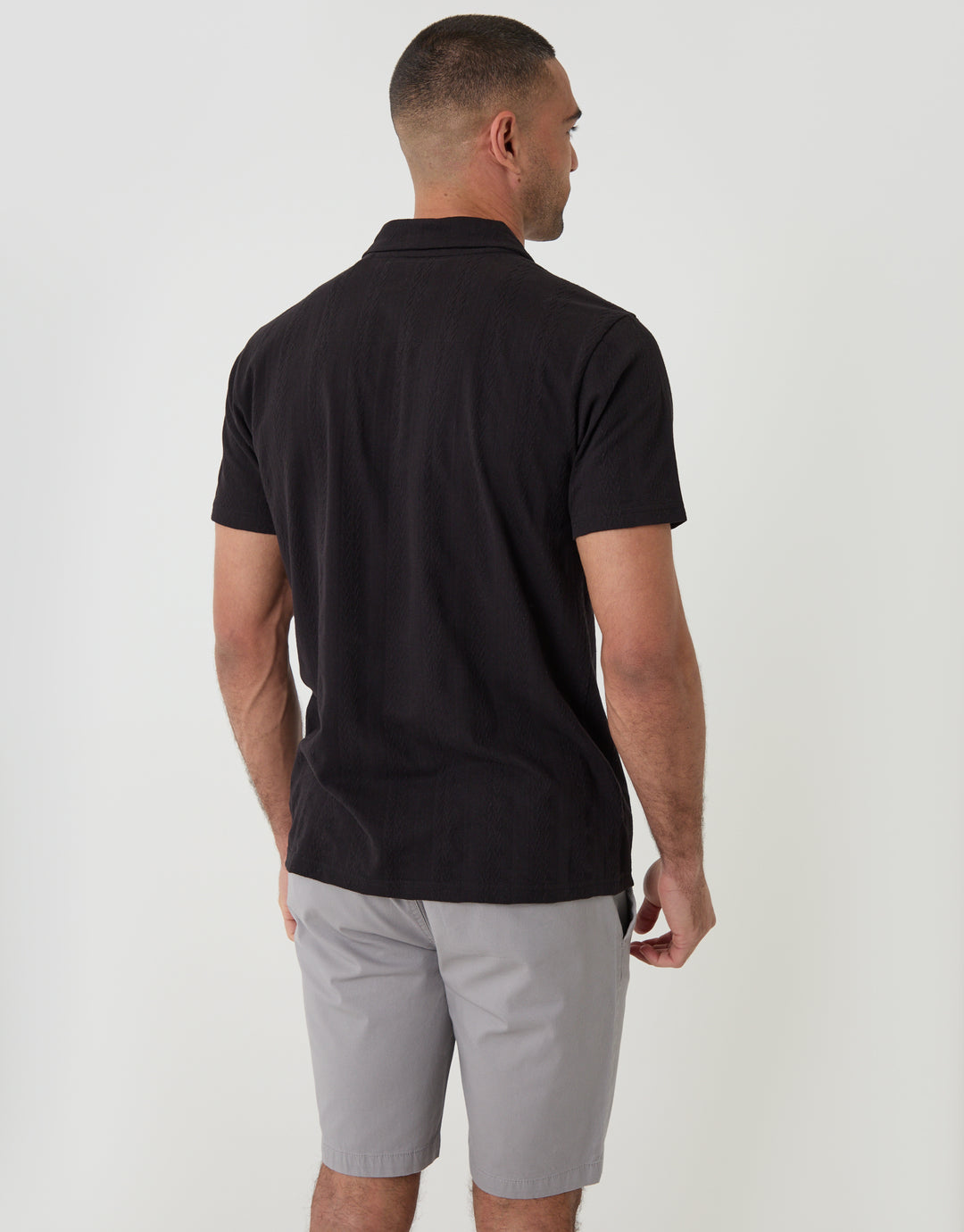 Threadbare Textured Cotton Polo Shirt in Black - back view