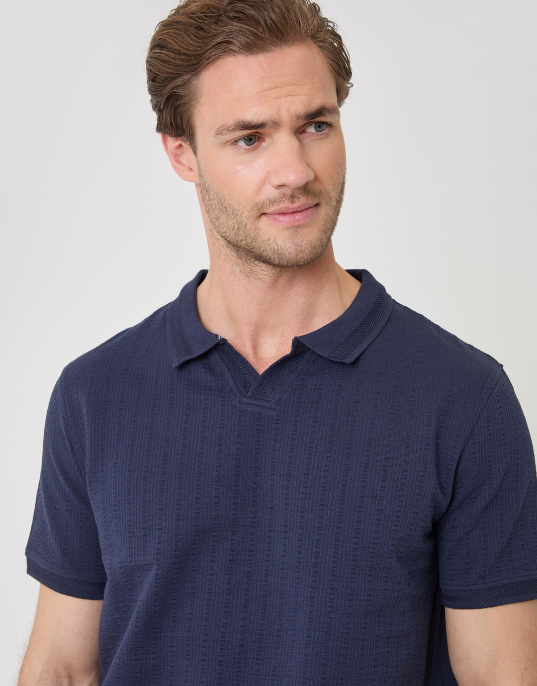 Threadbare Trophy Neck Textured Stretch Cotton Polo Shirt in Navy - close up