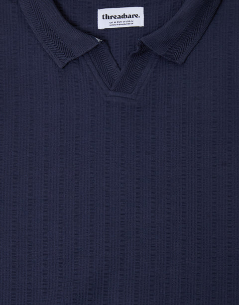 Threadbare Trophy Neck Textured Stretch Cotton Polo Shirt in Navy - close up