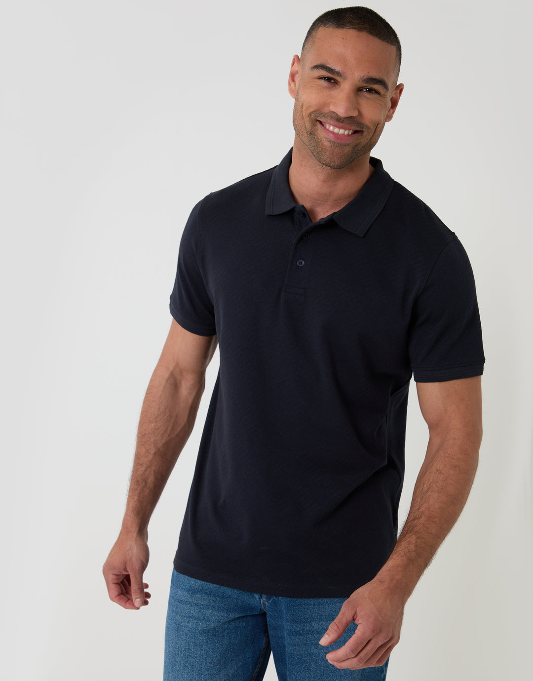 Threadbare Textured Cotton Polo Shirt in Navy - front view
