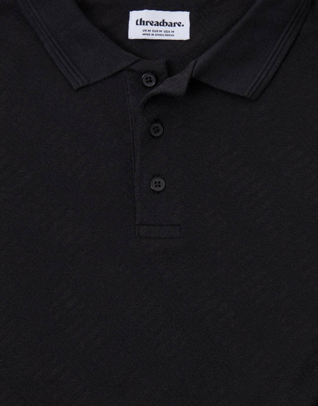 Threadbare Textured Cotton Polo Shirt in Black - close up detail