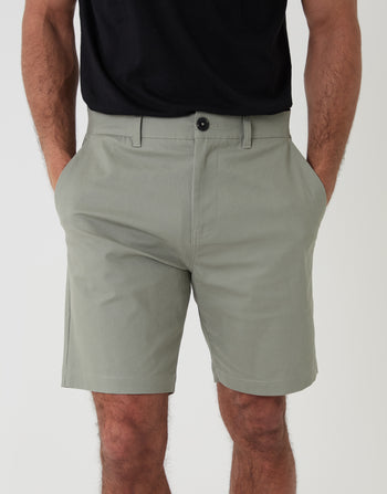 Threadbare Regular Fit Stretch Chino Shorts in Sage Green - front close up view hands in pocket