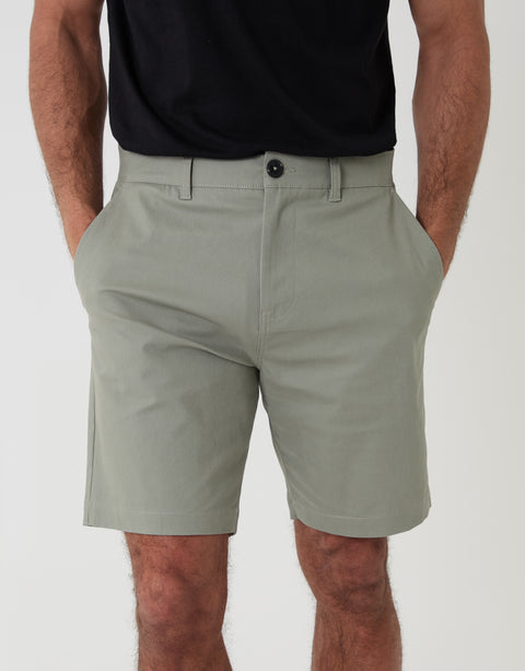 Threadbare Regular Fit Stretch Chino Shorts in Sage Green - front close up view hands in pocket