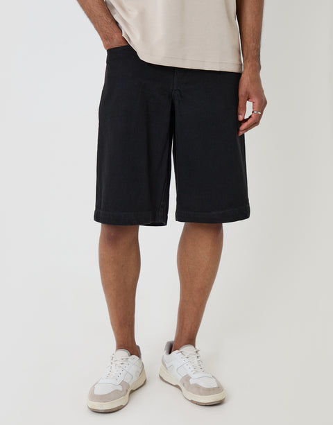 Threadbare Baggy Fit Denim Shorts in Black -  front view hand in pocket