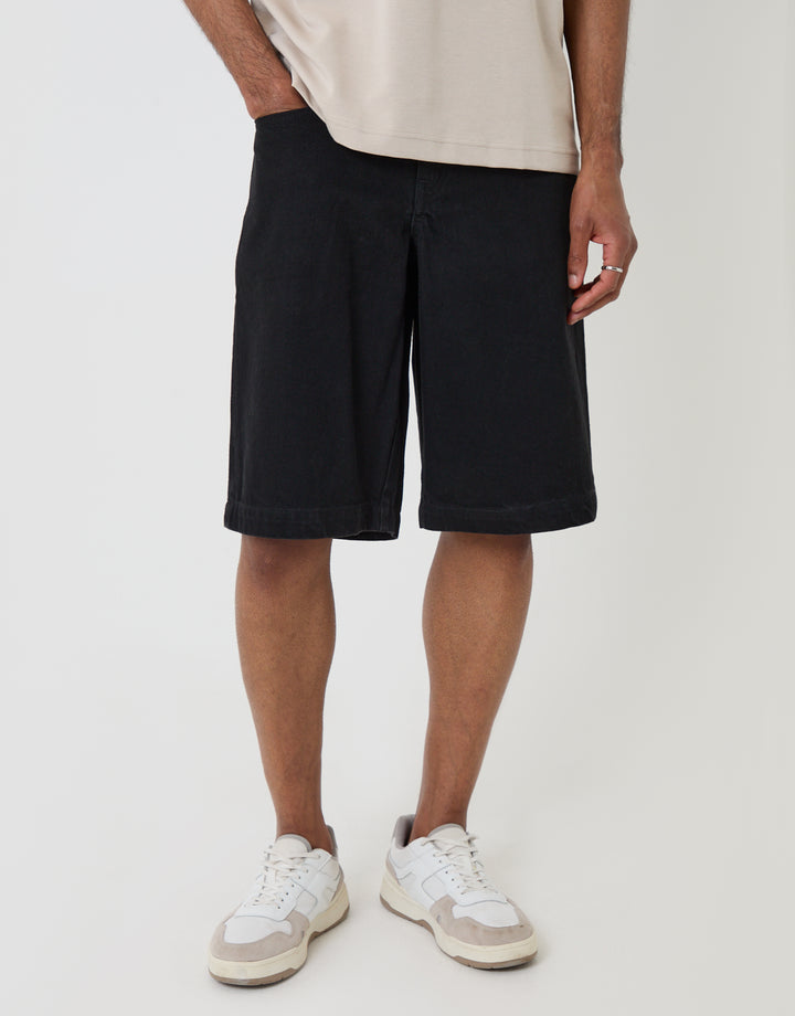 Threadbare Baggy Fit Denim Shorts in Black -  front view hand in pocket