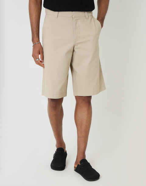 Threadbare Baggy Fit Cotton Chino Shorts in Stone - front view, hand in pocket