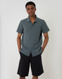 Threadbare Baggy Fit Cotton Chino Shorts in Black - front view