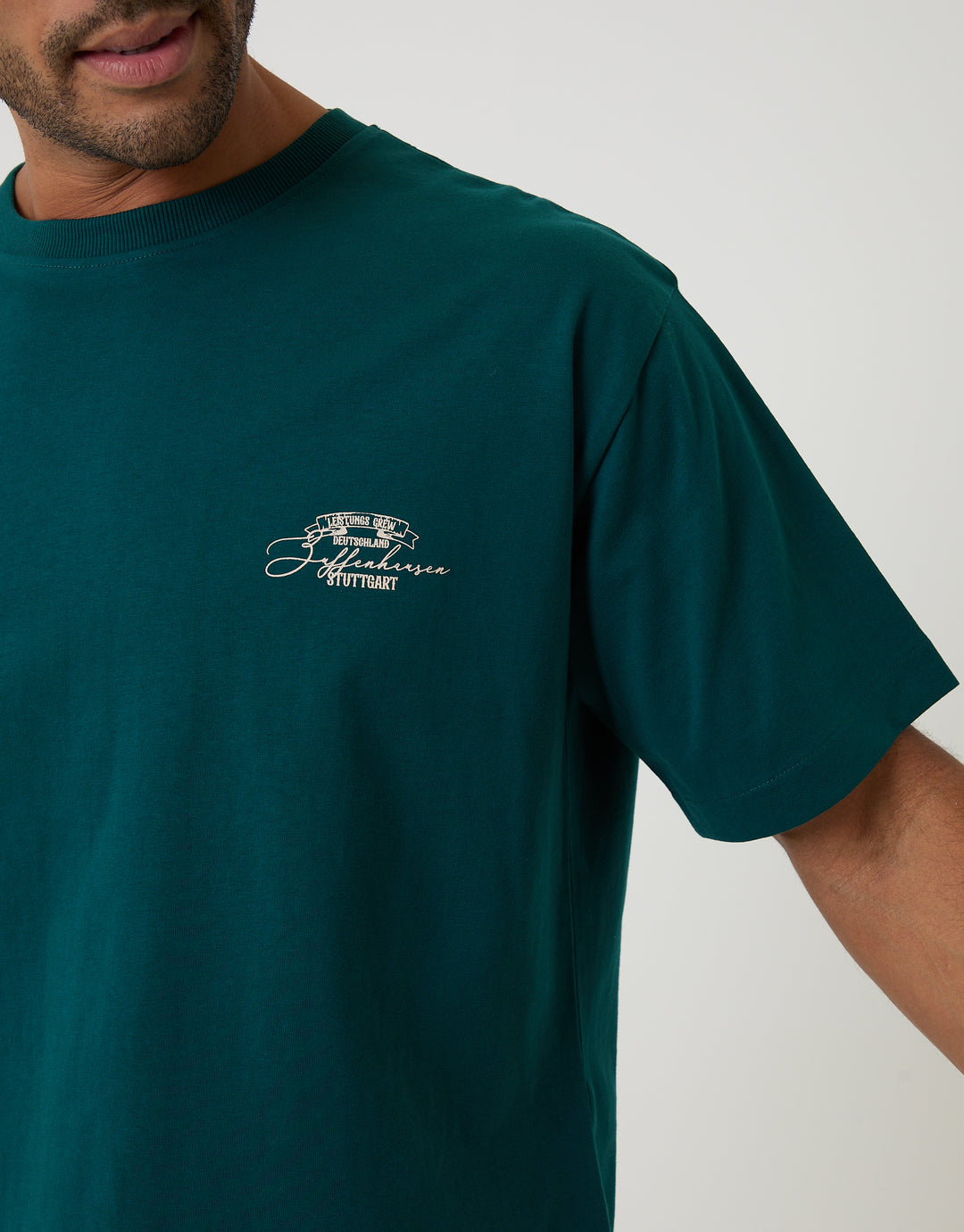 Threadbare Boxy Fit Stuttgart Print Cotton T-Shirt in Teal Green - close up