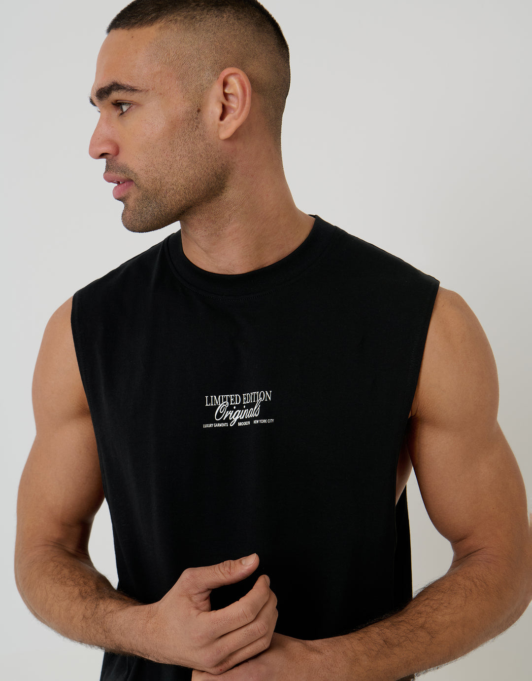 Threadbare Relaxed Fit Graphic Print Cotton Vest in Black - front view close up