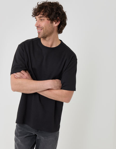 Threadbare Relaxed Fit Textured Cotton T-Shirt in Black - front view