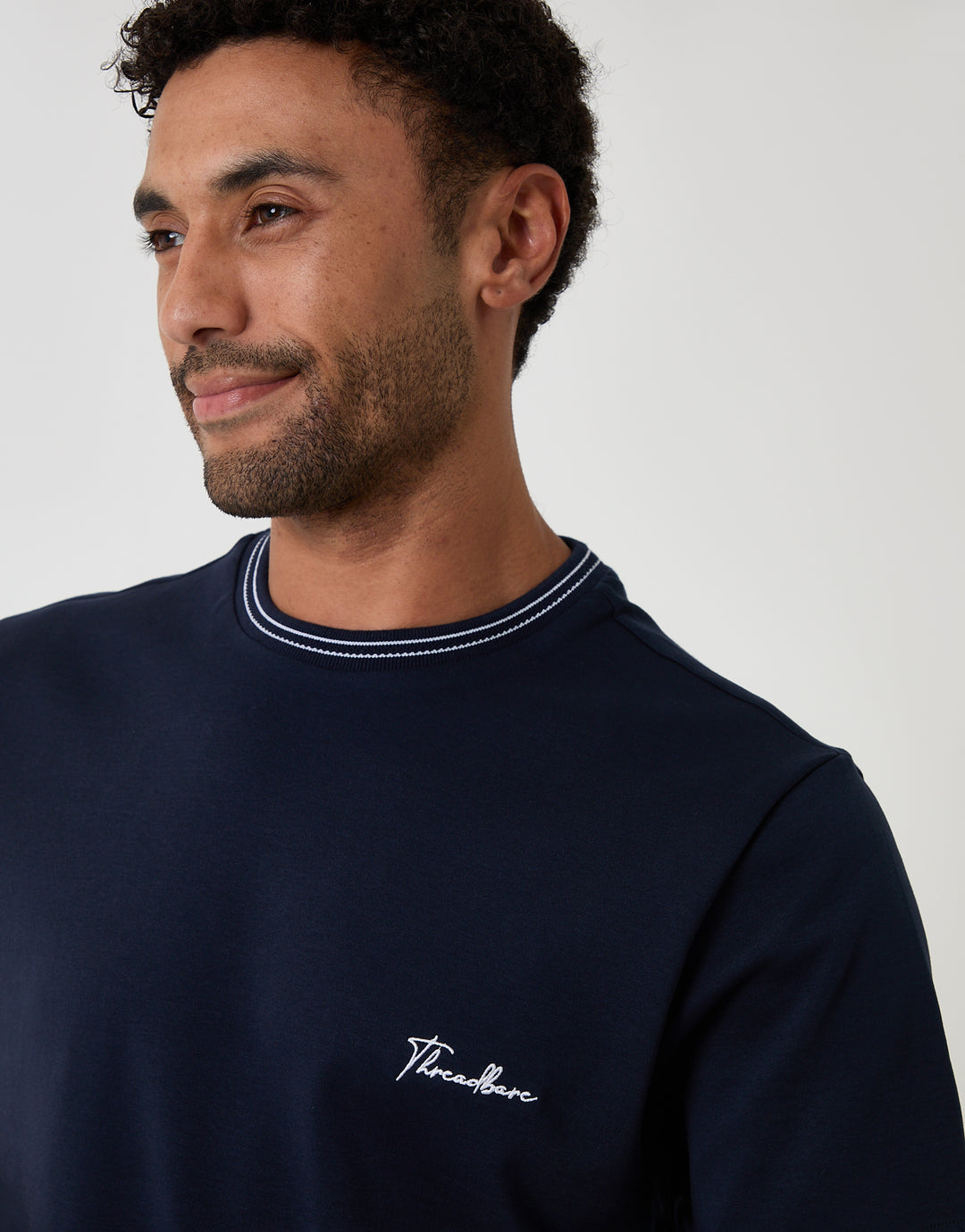 Threadbare Cotton Crew Neck Script T-Shirt in Navy - front graphic close up
