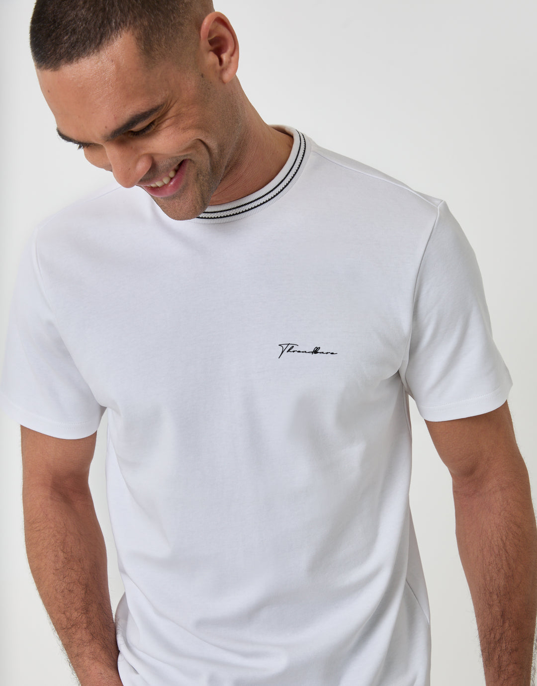 Threadbare Cotton Crew Neck Script T-Shirt in White - front view close up