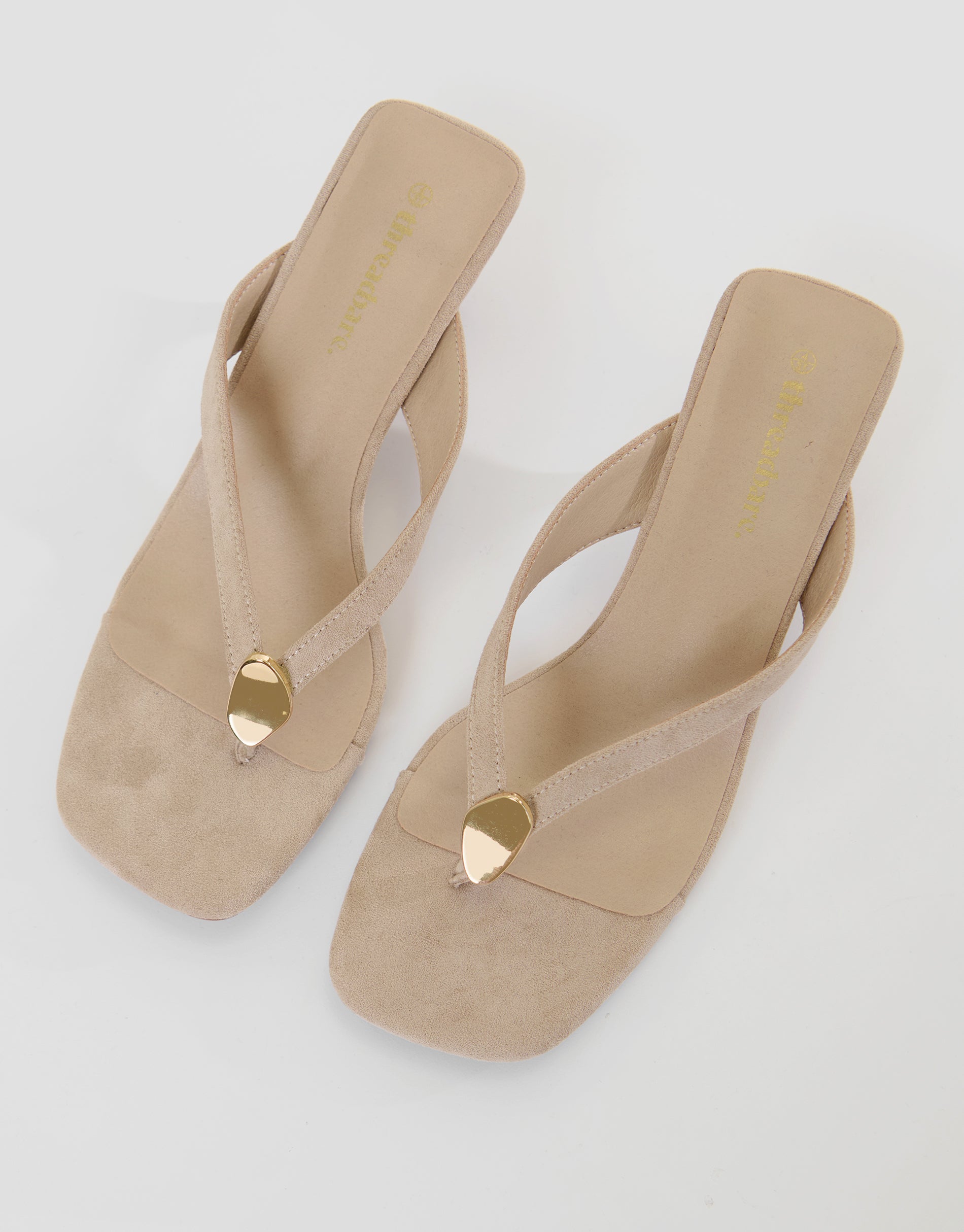 Toe Post Kitten Heels in Ecru